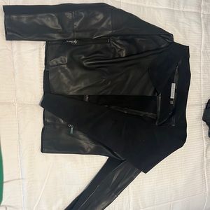 Bagatelle Collection open front faux leather jacket.